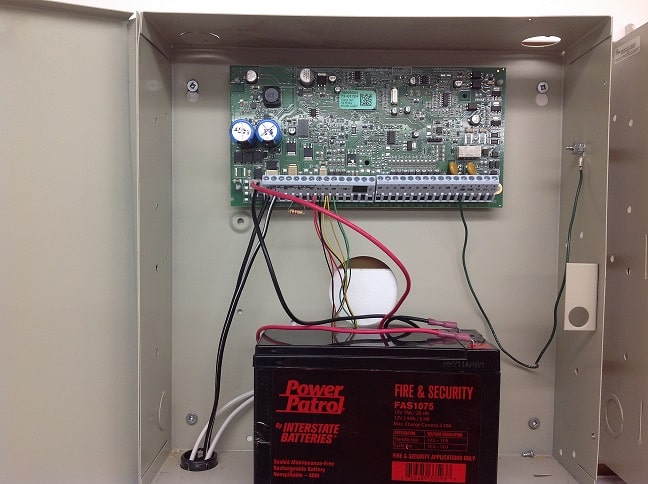 Image showing the location of the alarm backup battery in the control panel